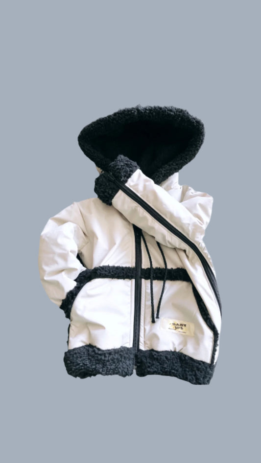 SnuggleZip Jacket in warm sand with black lining – adaptive kidswear